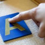 Diy Montessori Sand Writing Tray With Free Printable Letter With Letter Tracing In Sand
