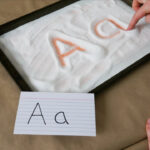 Salt Tray Writing | Preschool Activities Pertaining To Letter Tracing In Sand