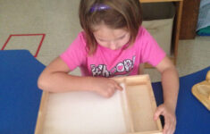 Tracing The Sandpaper Letter And Drawing It In Sand Tray regarding Letter Tracing In Sand